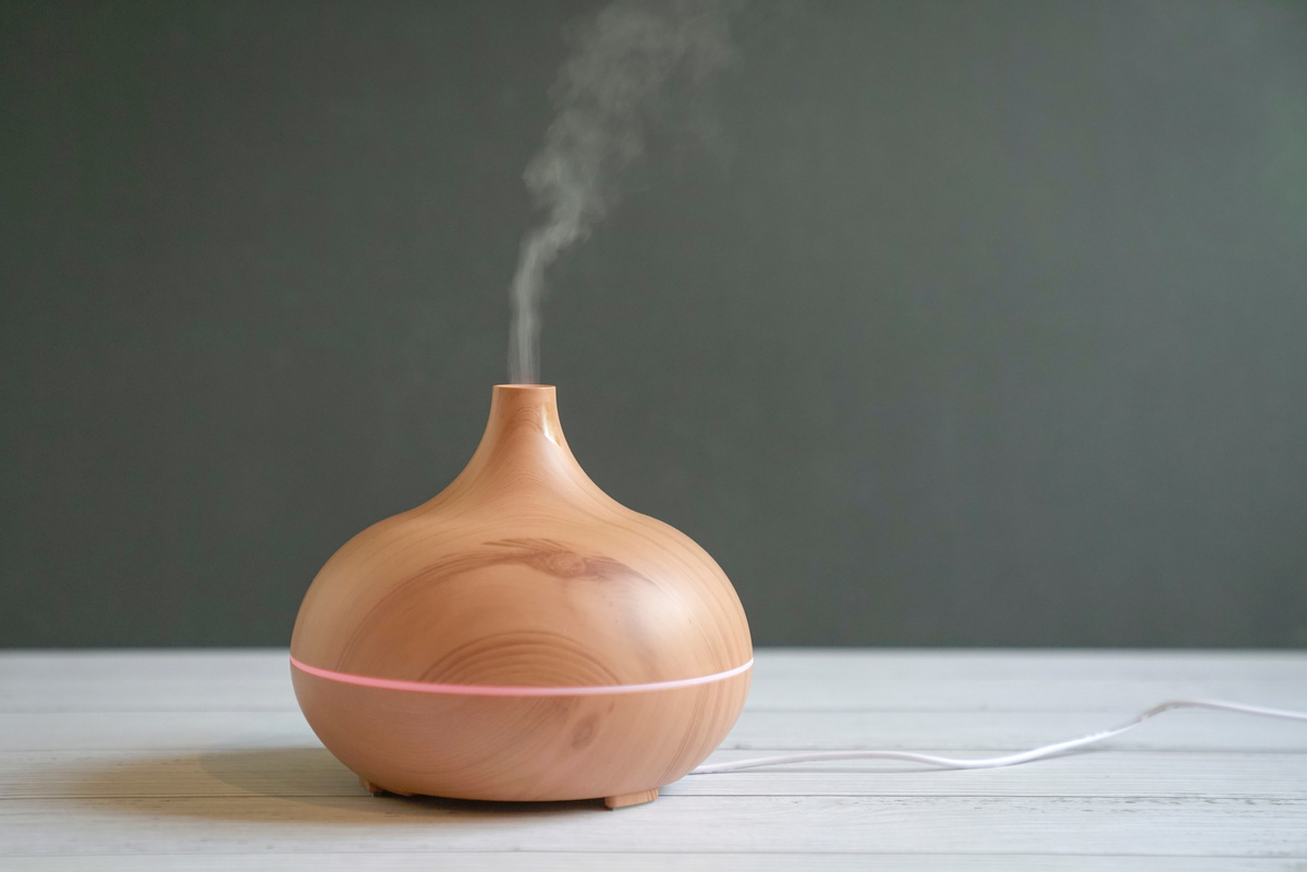 Aroma oil diffuser on table.